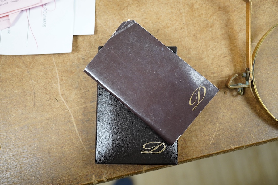 A cased Dupont 'gold dust' lighter with booklet. Condition - good